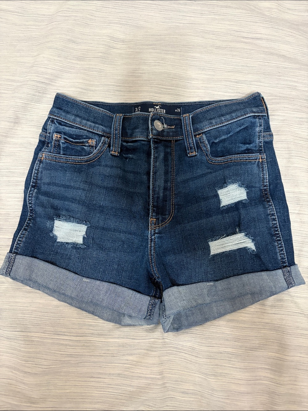 Hollister Women's Dark Blue Rolled-Hem Distressed Denim Shorts